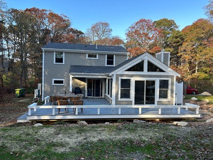 East Orleans Cape Cod vacation rental - Back of house - huge deck outdoor dining