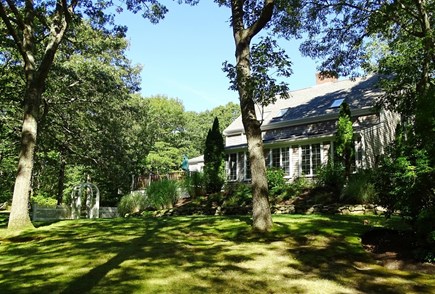 Barnstable Cape Cod vacation rental - View of house as you approach from driveway, private and lush