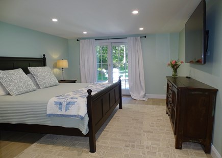 Barnstable Cape Cod vacation rental - New downstairs king bedroom with walk out to back yard
