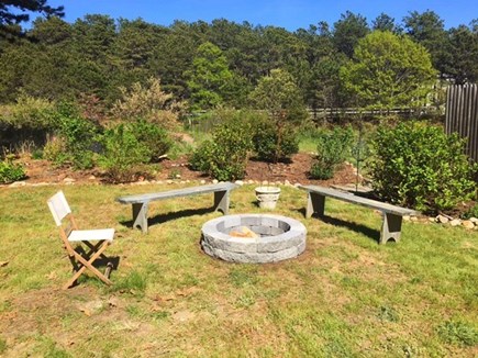 Eastham Cape Cod vacation rental - Fire pit - to the left is a hammock.