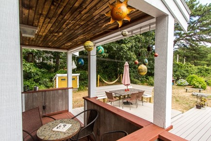 Eastham Cape Cod vacation rental - Covered porch, deck, hammock.