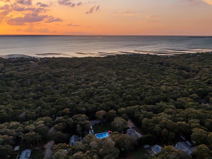 Eastham Cape Cod vacation rental - Aerial showing 3 By the Sea and the sunsetting over the Bay.
