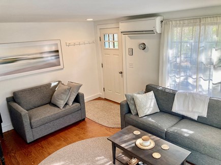 Wellfleet Cape Cod vacation rental - Living Room area with Queen & Twin Pull-out sofas and A/C.