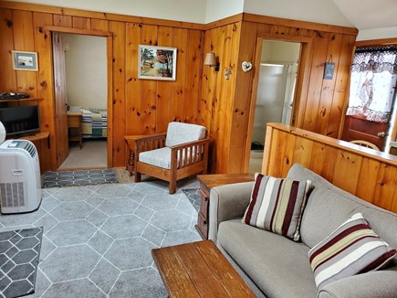 Dennis Port Cape Cod vacation rental - Living room open to kitchen with portable window AC