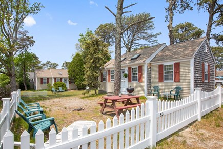 Dennis Port Cape Cod vacation rental - Picnic table with Smokey Joe and adirondack chairs
