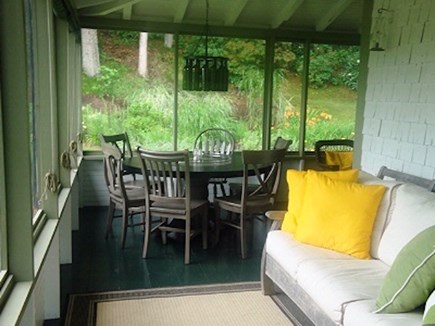 Wellfleet Cape Cod vacation rental - Nice dining and  lounging area in the screened in porch