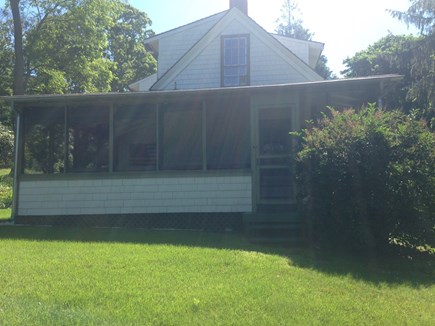 Wellfleet Cape Cod vacation rental - Screened In Porch off main house.  Has a couch and dining table