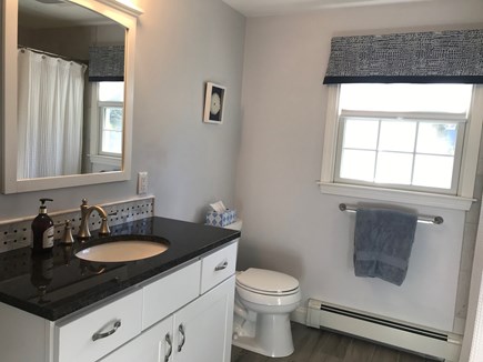 Osterville Cape Cod vacation rental - 1st floor full bath w/washer and dryer and tiled tub/shower