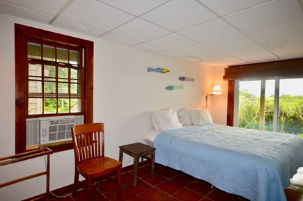 East Orleans Cape Cod vacation rental - Lower level king bedroom with sliders to private patio and AC