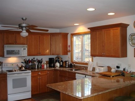 Wellfleet Cape Cod vacation rental - Kitchen with eating bar, open to dining.