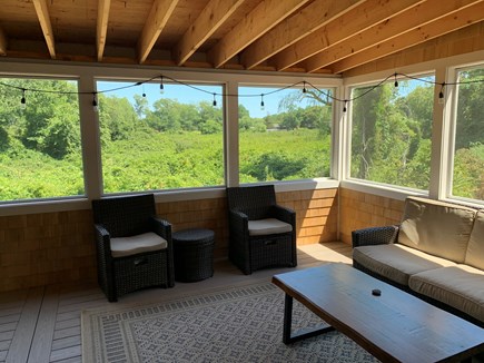 Eastham Cape Cod vacation rental - Sitting area on large screened in porch