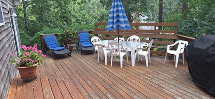 Wellfleet; less than a mile to Cape Cod vacation rental - Large shaded deck for dining al fresco or relaxing.