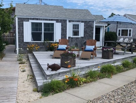 Beach Point / North Truro Cape Cod vacation rental - Our cottage with sunny private use deck overlooking courtyard