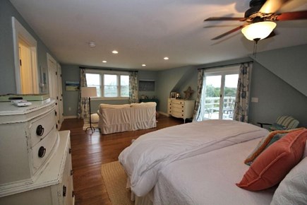 Truro Cape Cod vacation rental - Master Bedroom has king bed, comfy couch looks out to the Bay