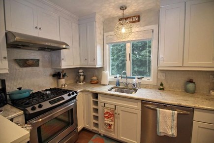 Truro Cape Cod vacation rental - Kitchen has free-standing island with seating