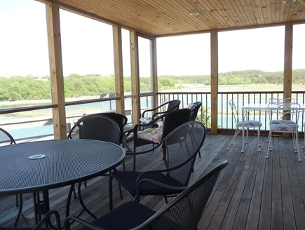 Truro Cape Cod vacation rental - Expansive screen porch has casual furniture and a gas grille