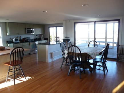 Truro Cape Cod vacation rental - Kitchen, dining with doors to porch and deck