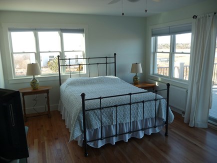 Truro Cape Cod vacation rental - Master bedroom with private bath opens to upper deck