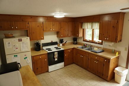 Eastham Cape Cod vacation rental - The kitchen has a new fridge with ice+water as of 2021