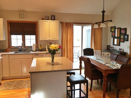 Brewster Cape Cod vacation rental - Kitchen...dining room...slider to deck