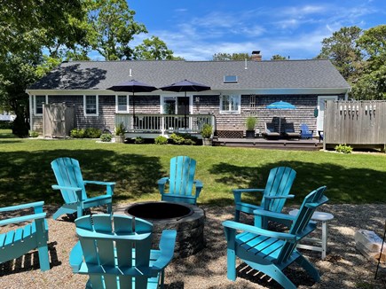 South Chatham Cape Cod vacation rental - Outdoor fire-pit, huge deck and patio seating.
