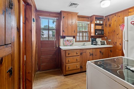 Dennis Port Cape Cod vacation rental - Galley Kitchen with view to sunrise on the deck