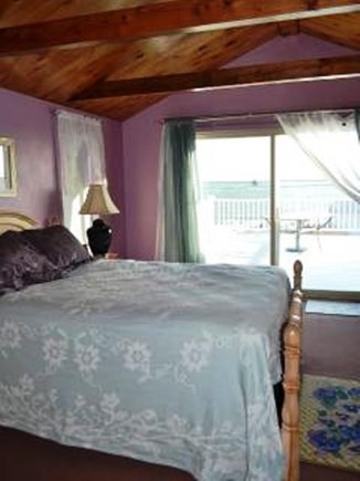 Dennisport Cape Cod vacation rental - Master bedroom leads to second story deck. Great views.