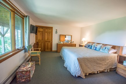 Truro Cape Cod vacation rental - Master Bedroom—king bed & master bathroom w/mermaid decor.