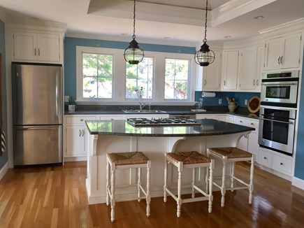 Eastham Cape Cod vacation rental - Open Floor plan with a great kitchen! Center island gas stove.