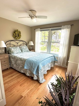 Eastham Cape Cod vacation rental - Sun filled front bedroom with queen bed and full closet.