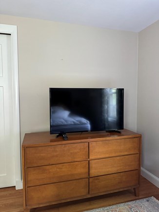 Falmouth Cape Cod vacation rental - 40" smart TV in primary bedroom.