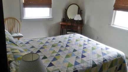 Provincetown Cape Cod vacation rental - Comfortable queen bed in rear bedroom with closet and dresser.