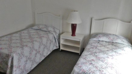Provincetown Cape Cod vacation rental - The middle bedroom boasts twin beds a closet and dresser.