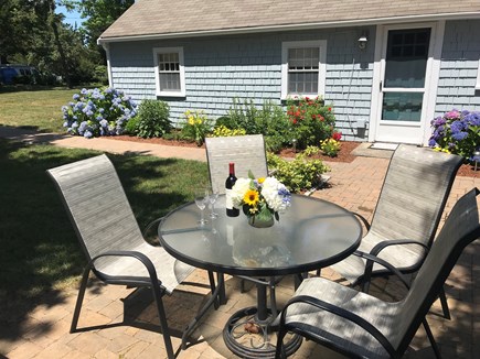 East Orleans Cape Cod vacation rental - Patio seating includes a propane gas grill.