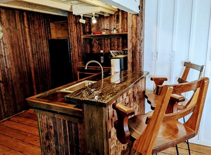 Falmouth Cape Cod vacation rental - Kitchen and bar seating area.