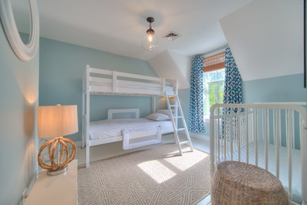 Harwich Port Cape Cod vacation rental - Upstairs guest bed with twin bunk beds