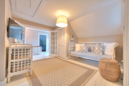 Harwich Port Cape Cod vacation rental - Upstairs family room with twin day bed, central AC, TV, Wii