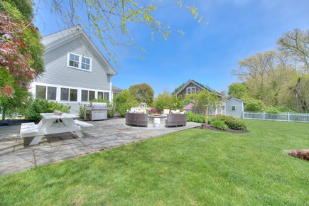 Harwich Port Cape Cod vacation rental - Patio with fire pit, XL gas grill, picnic table