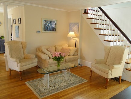 Onset, Buzzards Bay MA vacation rental - Living room with wood floors, open to dining