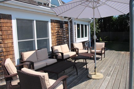 East Orleans Cape Cod vacation rental - Backyard patio.  New electronic awning not shown.