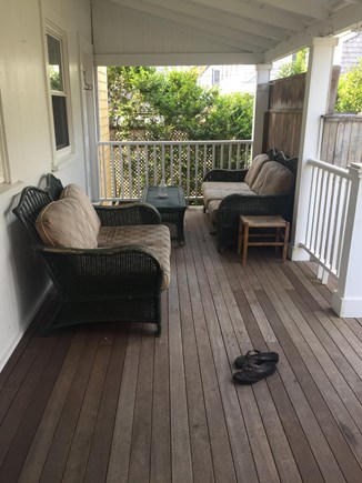 Harwichport Cape Cod vacation rental - Rear open air deck overlooking lawn