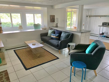 East Falmouth  Cape Cod vacation rental - The living room area has a TV and fireplace.