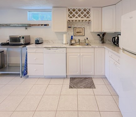 East Falmouth  Cape Cod vacation rental - The kitchen with fridge, dishwasher,  cooktop, toaster oven...