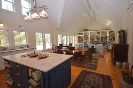 Truro Cape Cod vacation rental - Chef's kitchen and living/dining room with sliders to pool