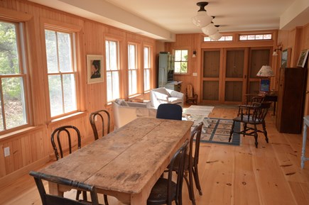 Truro Cape Cod vacation rental - Pool House dining/ living area- Big barn doors open to pool
