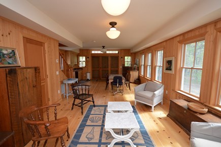Truro Cape Cod vacation rental - Pool House Dining/ living room- Big barn doors open to driveway