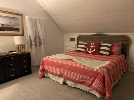 Harwichport Cape Cod vacation rental - Carriage house bedroom - opposite the king is two twin beds