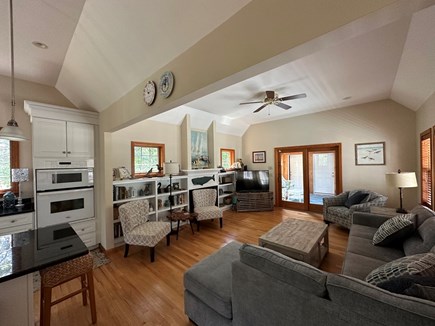 Eastham Cape Cod vacation rental - Family Room. Entrance to screen porch right, kitchen left.