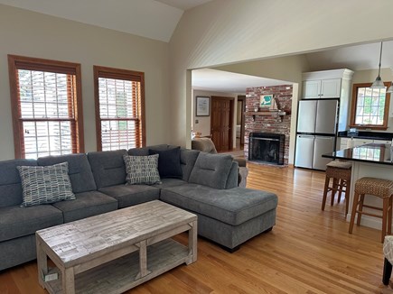 Eastham Cape Cod vacation rental - Family Room to kitchen, front hall, to 1st floor bedroom.