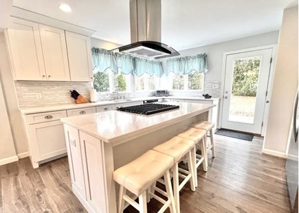 Popponesset, New Seabury, Mashpee, Poppones Cape Cod vacation rental - Modern Chef's Kitchen with Stainless and Silestone counters
